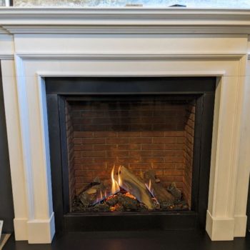 Chesneys Burlington fireplace with Stovax & Gazco Reflex 75T Edge gas fire with brick effect lining