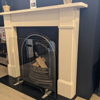 Chesneys Classic Victorian fireplace with the Britton No 4 Arched register grate in showroom